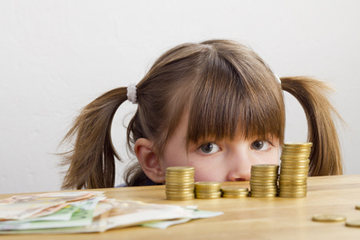 Kindern den Umgang mit Geld beibringen